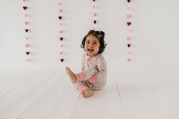 Babysprouts Long Sleeve Zip Romper Rainbow Hearts