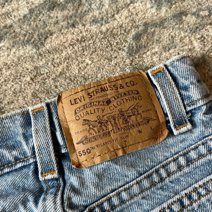 Vintage Levi's 550 Relaxed Fit Slim Distressed Orange Tab Jeans 7