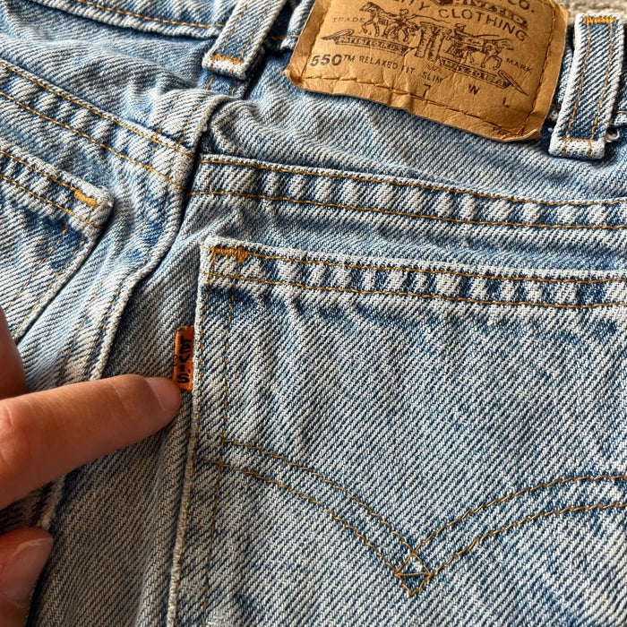 Vintage Levi's 550 Relaxed Fit Slim Distressed Orange Tab Jeans 7